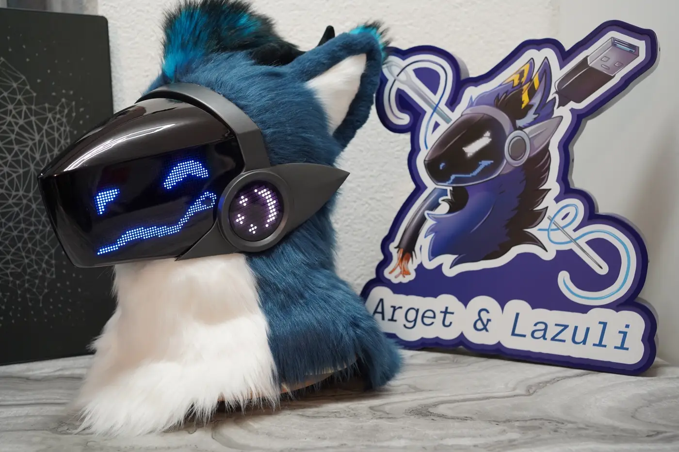 Blue and white Protogen head with a blue smile on the black LED visor