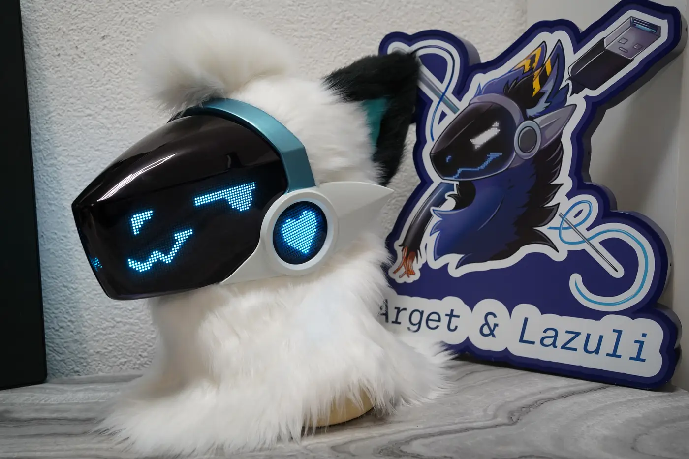 White Protogen head with a winking cyan pixel eye and a w shaped mouth on the black LED visor
