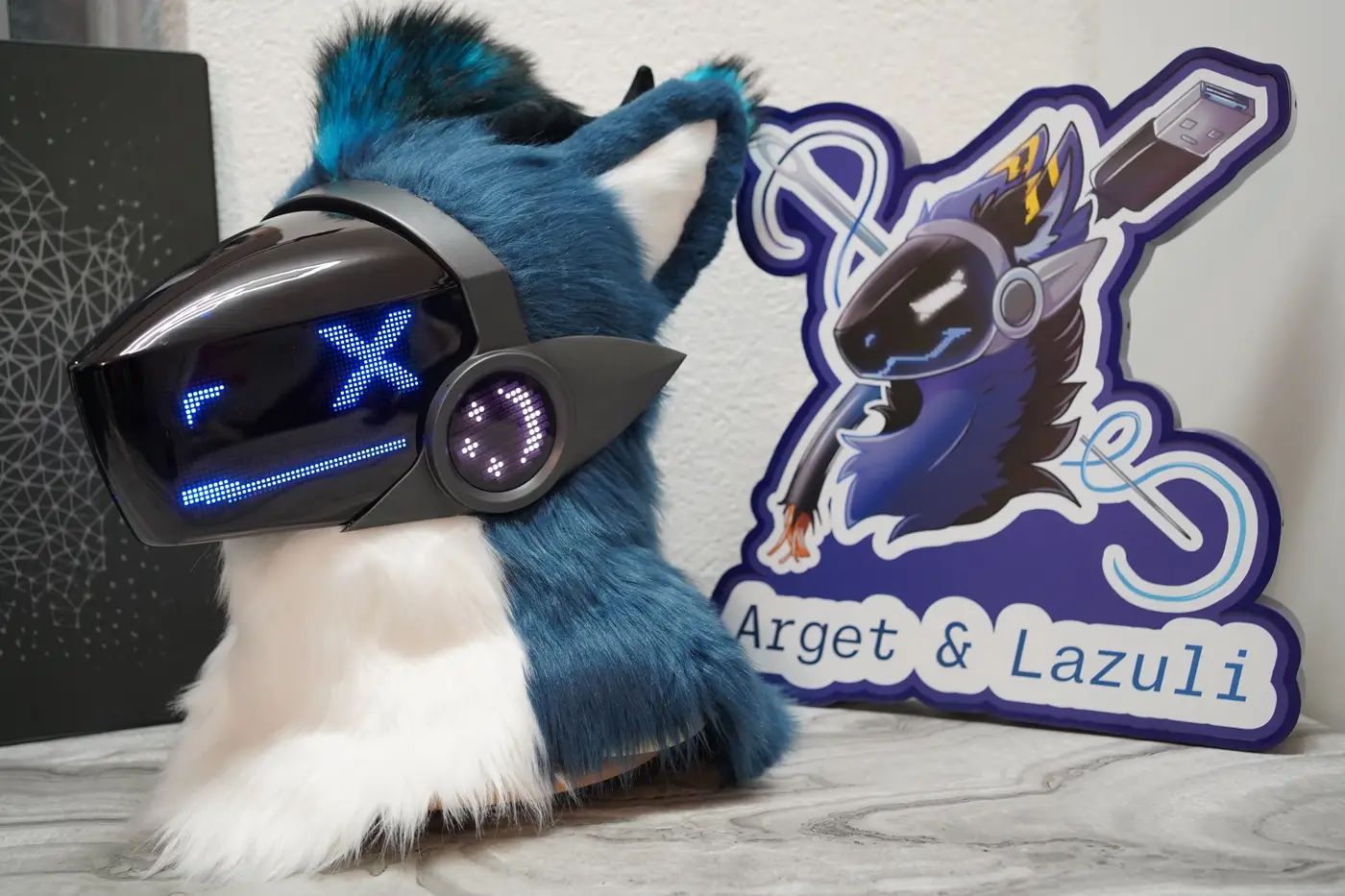Blue and white Protogen head with one blue eye closed on the LED visor
