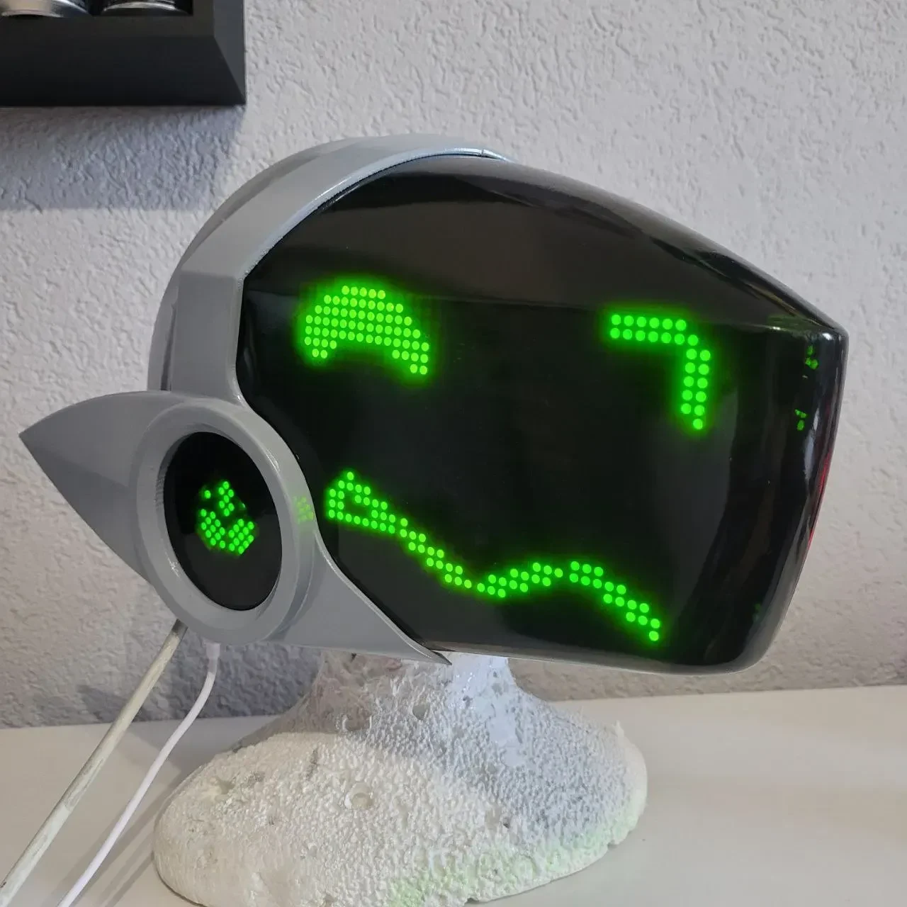 Completed Protogen head kit: painted gray Protogen head with a green LED visor, by Arget & Lazuli